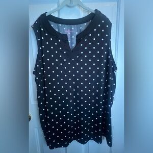 Woman Within Black and White Sleeveless Blouse